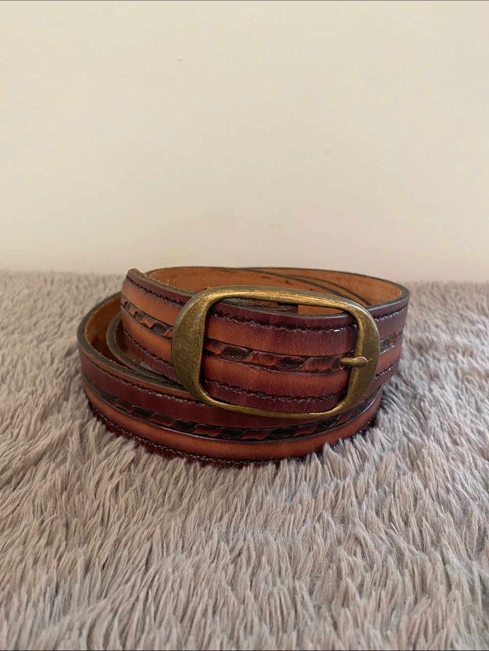 Vintage brown tooled leather belt 47” long 1.5” wide brass